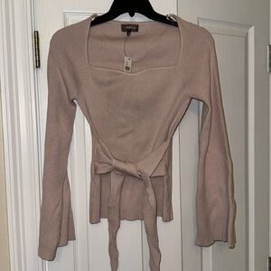 Pink sweater with tie